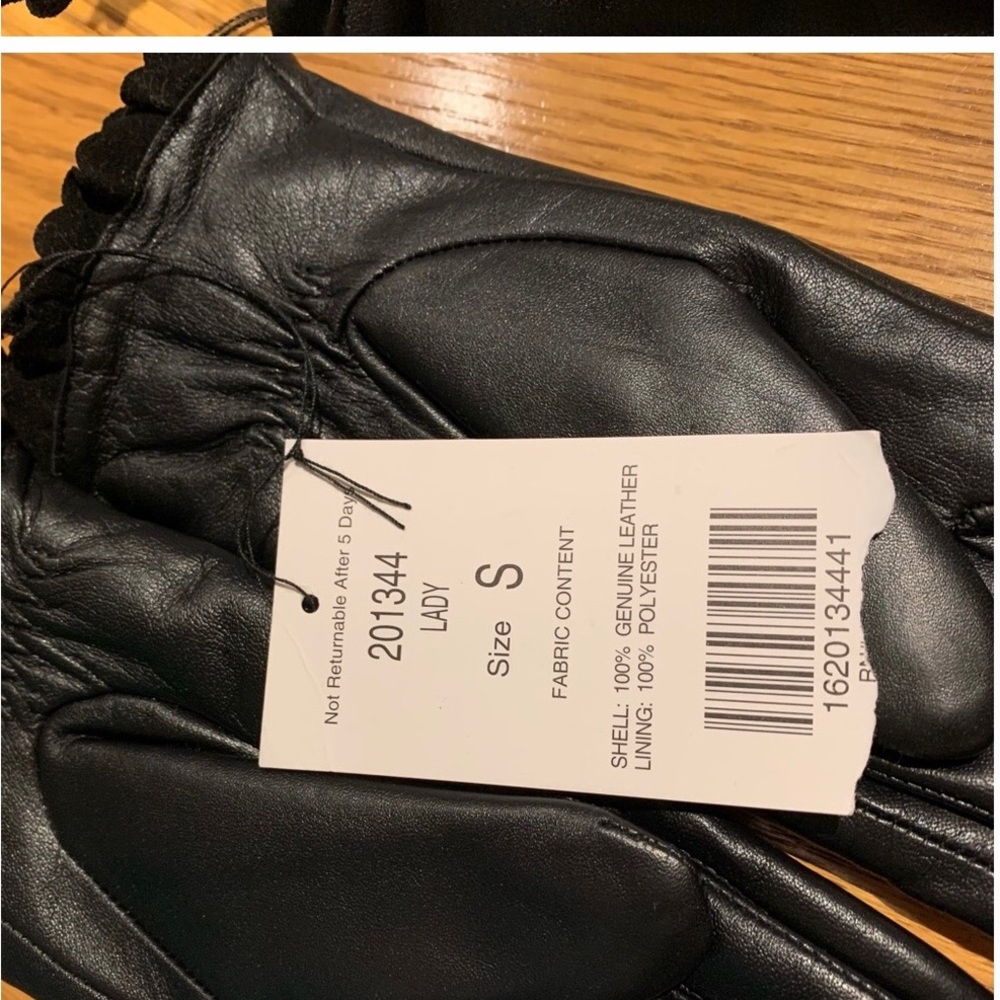 NWT leather “LADY” gloves. Sadly too small for me to wear. Price is firm.